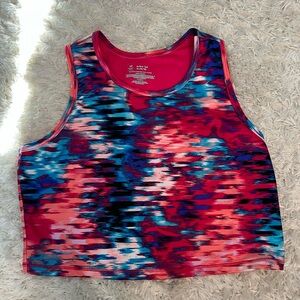 Vibrant multicolor matching set. Tank and spandex bottoms. Never worn